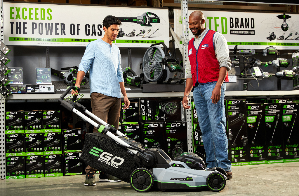 Shopper looking at lawn mower