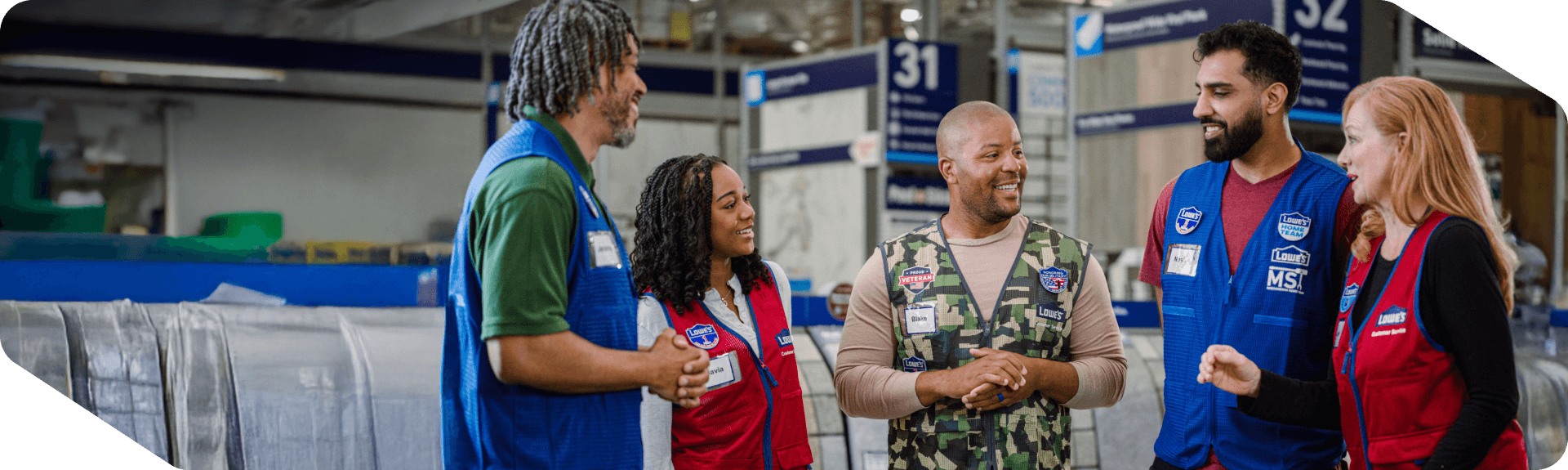 Associates having a meeting in the lumber department