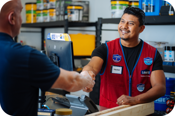 Lowe's bilingual associate assisting a customer with his purchase